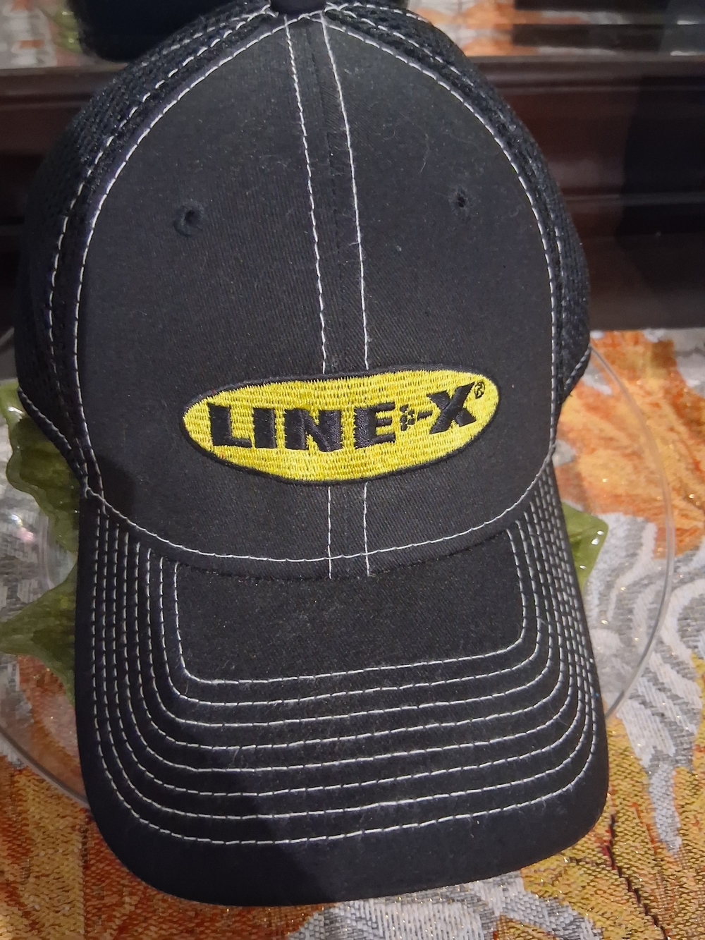 New Era Black Hat with White Logo Tag